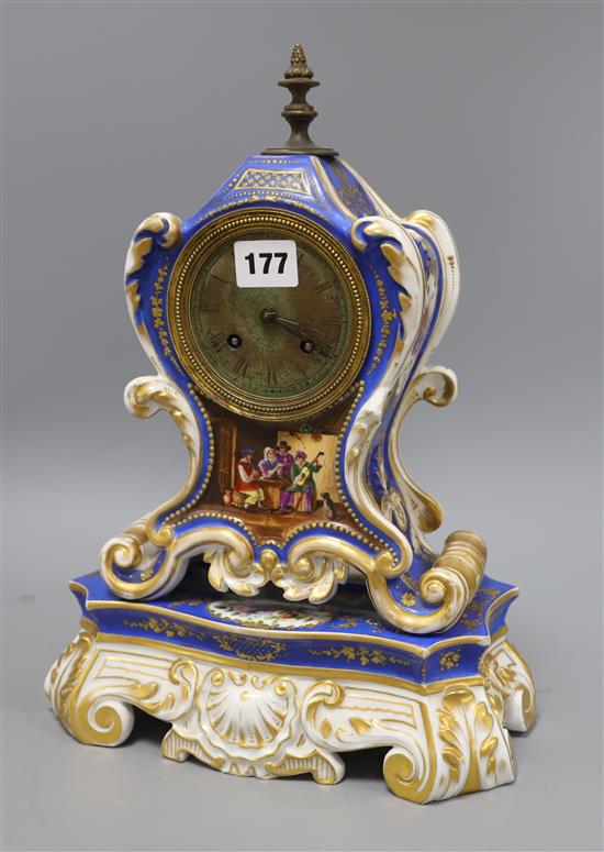A French porcelain clock on stand H.38cm